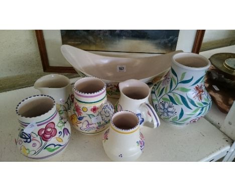 Seven various white bodied Poole Pottery items.