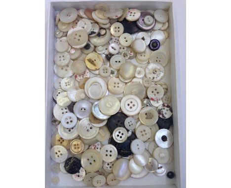 A collection of various mother of pearl and other buttons.