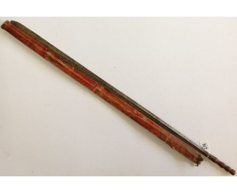 A Masai sword and scabbard. Length of blade approximately 76cm. 