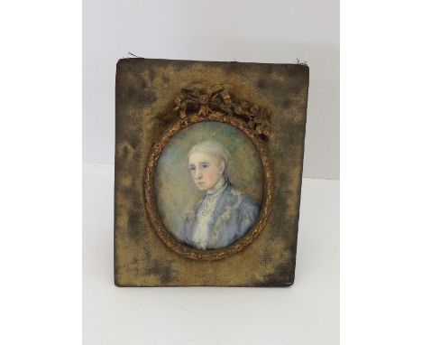 A late 19th century framed and glazed miniature on ivory: Woman in blue Kimono dress wearing a pearl necklace.