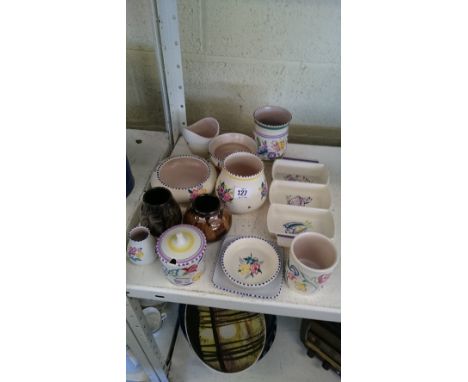 Thirteen various Poole Pottery items.