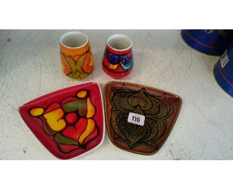 Two Poole Pottery Delphis vases, shape 31, decorated in abstract patterns together with a Delphis tray, shape 81 and a simila