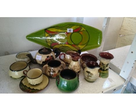 A small collection of Crown Dorset pottery including sugar bowls, vases, jug and teapot together with a Poole Pottery Delphis