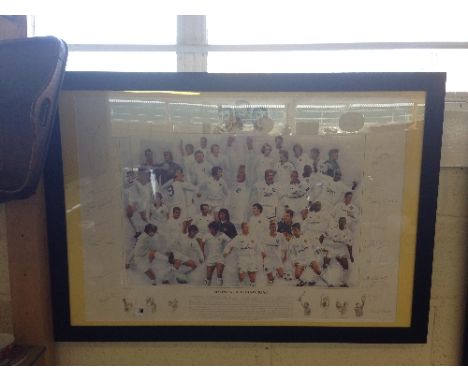 A framed signed football souvenir print: Legends of Elland Road depicting various Leeds United football players and signed to