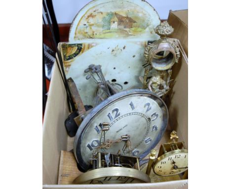 A box of miscellaneous clock parts, to include 19th century painted arch longcase clock dial, anniversary clock movement etc