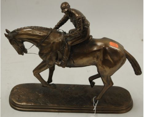 An Oliver Tupton bronzed resin model of a racehorse and jockey, on naturalistic base, bears signature, h.33cm