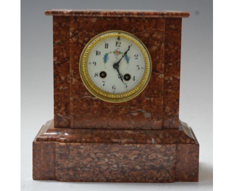 A late 19th century rouge marble cased mantel clock, the enamelled dial painted with flowers, having Arabic numerals, the eig