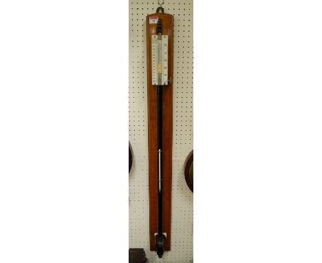 A late 19th century stick barometer, the ivory scale signed Fortinette, standard barometer, registered No. 420297 on oak back