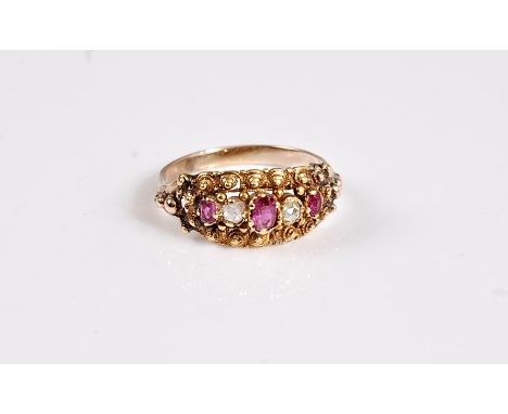 A five stone ruby and diamond ring, the three graduated rubies interspaced with rose cut diamonds, claw mounted with beaded b