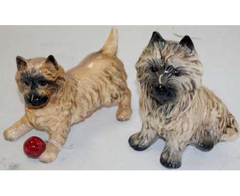 A Sylvac model of a terrier in seated pose, height 13cm, together with one other Beswick model of a terrier with a ball at hi