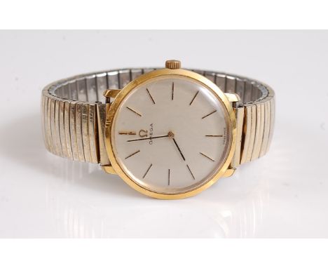 A gentleman's gold plated manual Omega, the signed round silvered dial with gilt baton numerals and hands, gold plated case, 