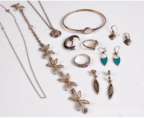 A quantity of silver jewellery to include a ruby and white hardstone ring, a dolphin ring, turquoise mosaic earrings, mother 