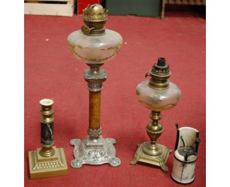 A 20th century oil lamp, having a squat globular font with overlaid decoration, on associated turned brass base; together wit