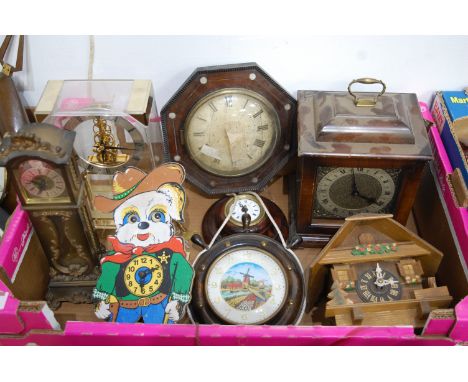 A Victorian rosewood cased and mother of pearl inlaid wall clock (lacking movement); together with a Continental novelty wall