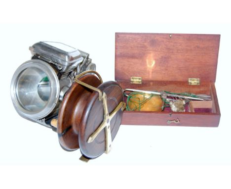 A 4½" mahogany centre pin fishing reel with brass star back and smooth brass foot, together with a Lucas Silver King cycle la