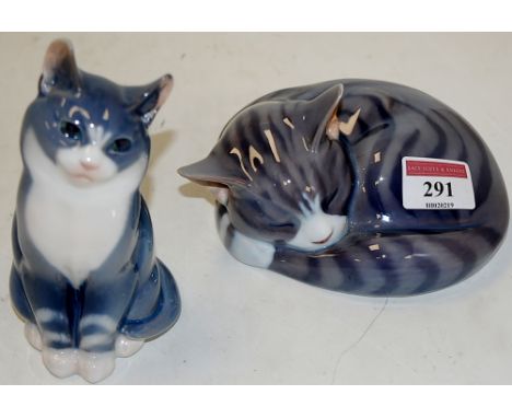 A Royal Copenhagen porcelain model of sleeping cat, printed mark verso numbered 422, width 12cm, together with one other Roya