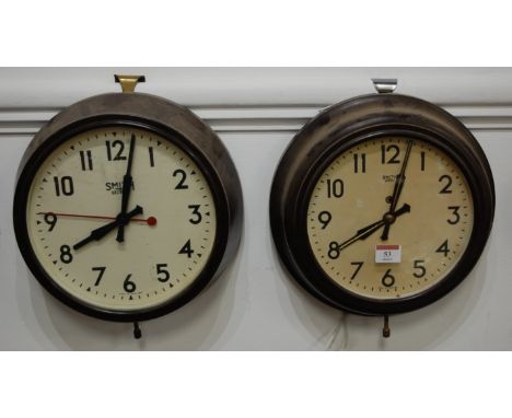 A circa 1930 Smiths Sectric bakelite cased wall clock, the dial with Arabic numerals, signed Smiths Sectric Made in England, 