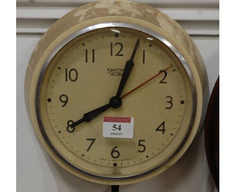 A circa 1940s Smiths Sectric bakelite cased electric wall clock, the dial with Arabic numerals, signed Smiths Sectric Made in