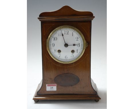 An early 20th century mahogany and boxwood strung cased mantel clock, having enamelled dial with Arabic numerals and eight da