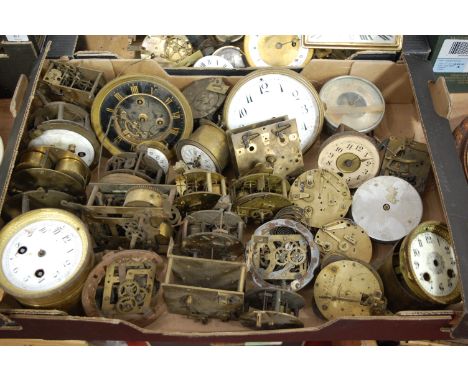 Three boxes of miscellaneous clock parts, to include dials, movements and accessories