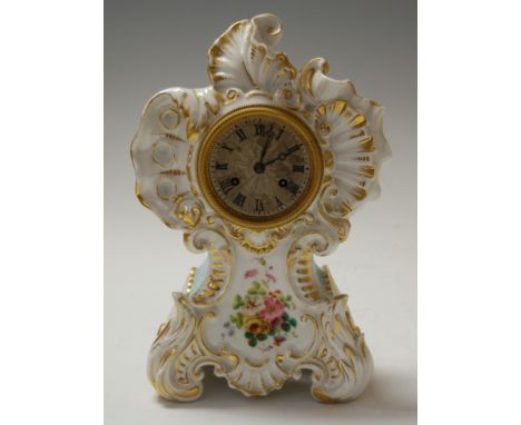 A 19th century French porcelain cased mantel clock, having a silvered dial with Roman numerals, the case having painted flora