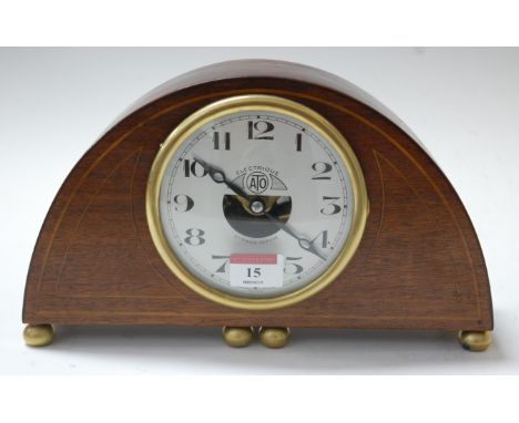 An early 20th century French mahogany cased electric mantel clock, the silvered dial with Arabic numerals and signed Electriq