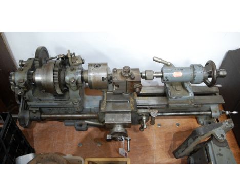 A Zyto bench-top watchmakers lathe; together with various watchmakers tools and accessories
