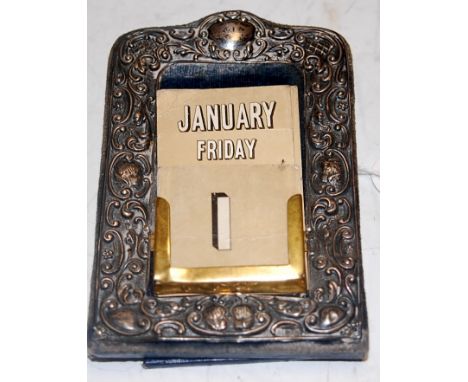 An Edwardian silver clad easel perpetual desk calendar