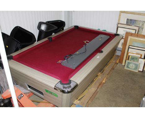 A Supreme pool table complete with overhead light