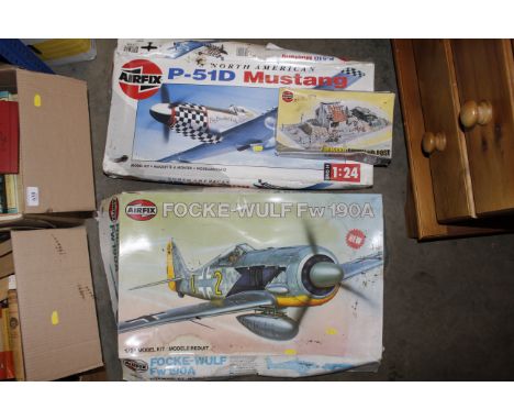 An Airfix model of a North American Mustang, another and an Airfix model of a Command Post