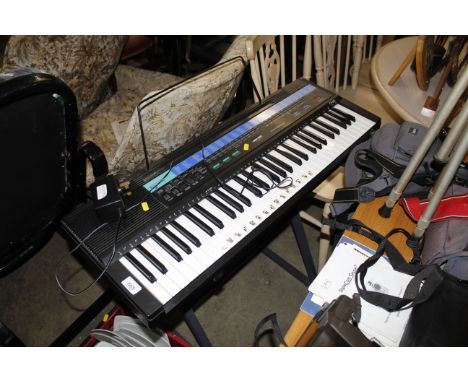 A Casio electric keyboard on stand