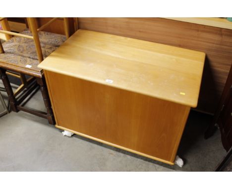 A modern light wood blanket chest and contents to include a sewing basket, vintage leather suitcase, briefcase etc. and twelv
