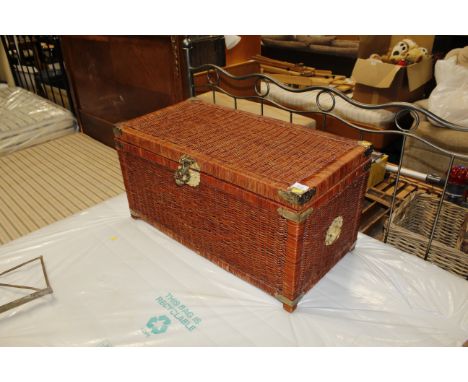 An oriental wicker and brass mounted trunk, an umbrella and an oil painting 
