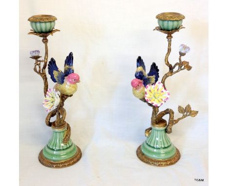 A Pair of Ceramic Bird Candlesticks
