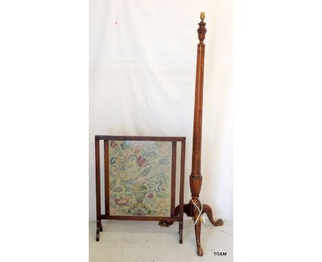 An Oak Framed Embroidered Fire Screen and a Mahogany Standard Lamp on Tripod Supports.