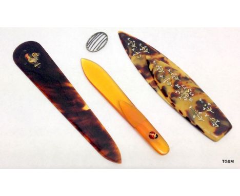 3 vintage bookmarks including a gold and enamel ladybird example