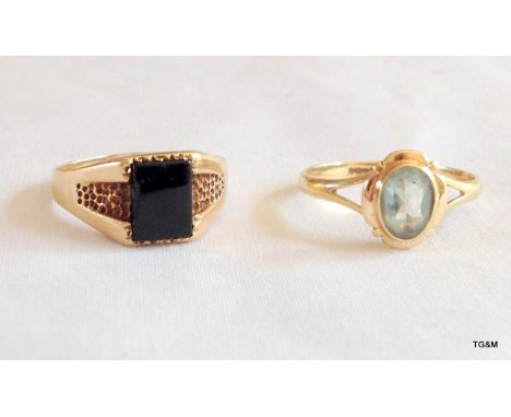 A men's 9ct gold signet ring and ladies 9ct gold aquamarine ring 