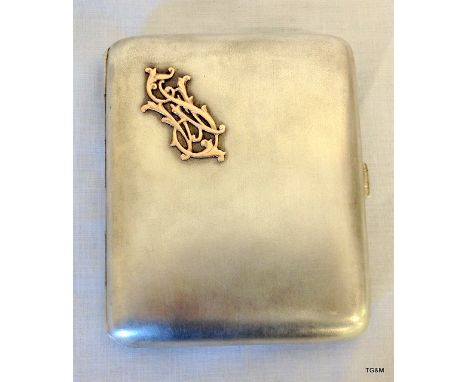 A Silver Cigarette Case with Gold Initials