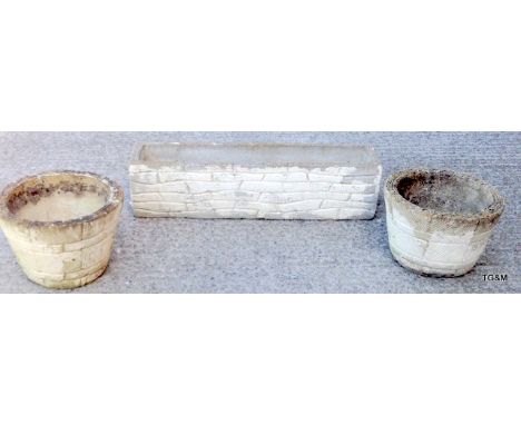 A Pair of circular garden planters and a trough