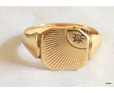 A 9ct gold mans diamond set signet ring size T