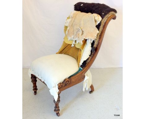 A Victorian button back nursing chair 88cm high