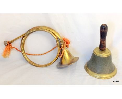 A copper hunting horn with a brass school bell