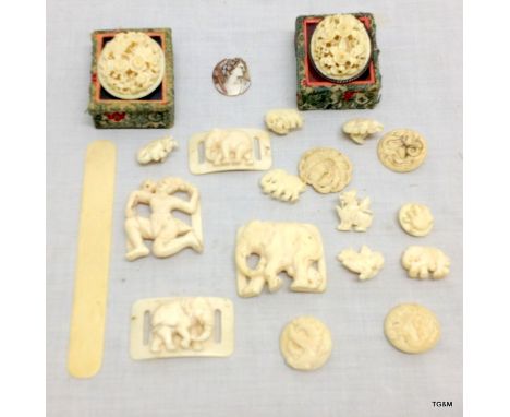 2 antique Cantonese carved plaques in enamel boxes and a quantity of carved ivory buckles and buttons