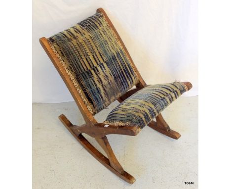 A rocking Gout stool 43cm high