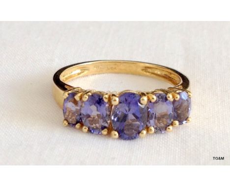 A 9ct Gold Hallmarked ladies Blue Stone Ring. Size Q