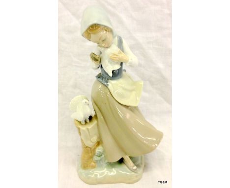 Lladro figure of girl with a dove 23cm high