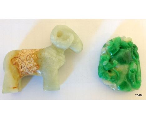 A carved jade ram and a green carved jade pendant