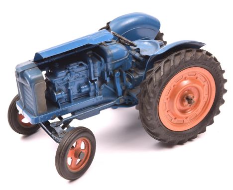 Chad Valley clockwork Fordson Major tractor. In light blue with orange wheels and black rubber tyres. AF-QGC. Clockwork actio
