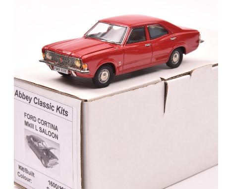 Abbey Classic Kits Ford Cortina Mk3 1.3L 4-door saloon 'Coke Bottle'. In deep 'Sunset' red with tan interior, silver wheels w