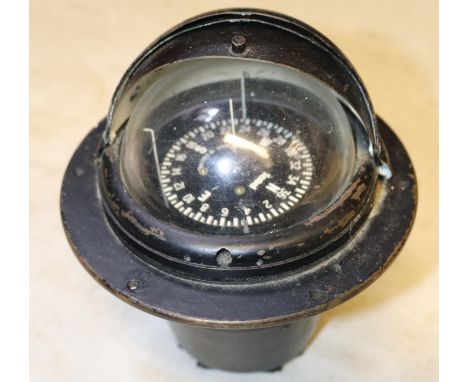 A Sestral Marine compass. Self leveling compass encased within a stand with sectional lid. Henry Brown &amp; Sons brass plaqu